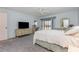 Spacious bedroom boasting natural light, comfortable carpeting, and a relaxing ambiance at 756 Avenida Estancia # 162, Venice, FL 34292