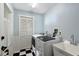 Bright laundry room with modern washer and dryer at 7767 Pine Trace Dr, Sarasota, FL 34243