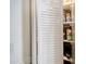 Pantry with shelving stocked with canned goods and other essentials, conveniently located and easily accessible at 7767 Pine Trace Dr, Sarasota, FL 34243