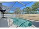 Screened-in pool area featuring a calming outdoor retreat at 7767 Pine Trace Dr, Sarasota, FL 34243