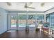 Enclosed sunroom featuring a pool view, providing an inviting space for relaxation and enjoyment of the outdoors at 7767 Pine Trace Dr, Sarasota, FL 34243