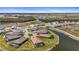 Aerial view of a new construction community with stunning lakes and beautiful landscaping at 8108 Wild Blue Ter, Sarasota, FL 34241