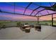 Lanai with outdoor seating offers beautiful sunset views and a tranquil setting, perfect for relaxation at 8108 Wild Blue Ter, Sarasota, FL 34241