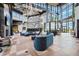 Inviting lounge area with comfortable seating, designer finishes, and a climbing wall offers a relaxing and active space at 8108 Wild Blue Ter, Sarasota, FL 34241