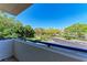 Balcony view of neighborhood with beautiful trees at 835 S Osprey Ave # 101, Sarasota, FL 34236