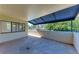 Balcony with awning overlooking the neighborhood at 835 S Osprey Ave # 101, Sarasota, FL 34236