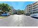 Apartment complex featuring well-maintained grounds and convenient parking areas for residents and guests at 835 S Osprey Ave # 101, Sarasota, FL 34236