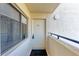 Exterior of condo door with security features and a modern design, providing a welcoming entrance at 835 S Osprey Ave # 101, Sarasota, FL 34236