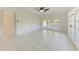 Spacious main bedroom with ceiling fan and access to balcony via glass doors at 835 S Osprey Ave # 101, Sarasota, FL 34236