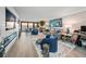 Bright living room featuring water views and contemporary decor at 101 Sunset Dr # 103, Sarasota, FL 34236