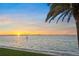 Expansive water view showcasing a picturesque sunset over the horizon at 101 Sunset Dr # 103, Sarasota, FL 34236