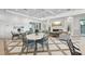 A bright and inviting lounge area with a fireplace, stylish seating, and a relaxing ambiance at 10530 Boardwalk Loop # 201, Lakewood Ranch, FL 34202