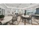 A bright and inviting lounge area with a fireplace, stylish seating, and a relaxing ambiance at 10530 Boardwalk Loop # 201, Lakewood Ranch, FL 34202