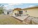 Backyard deck featuring outdoor furniture, great for relaxing and entertaining in this home's outdoor space at 108 21St Ne St, Bradenton, FL 34208