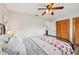 This bedroom features an open closet and an ensuite bathroom at 108 21St Ne St, Bradenton, FL 34208