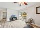 Open living room with sliding doors to the deck and backyard at 108 21St Ne St, Bradenton, FL 34208