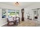 Inviting dining room with natural light and charming vintage-style furnishing at 1208 Angela Maria Rd, Sarasota, FL 34243