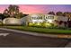 Community entrance sign for Lorraine Lakes at Lakewood Ranch surrounded by lush landscaping and palm trees at 16455 Whale Grey Pl, Bradenton, FL 34211