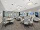 The meeting room offers tables and chairs for larger groups at 16455 Whale Grey Pl, Bradenton, FL 34211