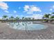 Enjoy this large community pool featuring plenty of lounge chairs and beautiful, mature palm trees at 16455 Whale Grey Pl, Bradenton, FL 34211