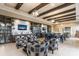 A library featuring ample shelving, comfortable seating, and a large table at 16719 Ellsworth Ave, Bradenton, FL 34202