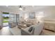 Relaxing living room with neutral tones and view of a pond at 16719 Ellsworth Ave, Bradenton, FL 34202