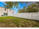 Wide angle of backyard features privacy fence and large yard at 2411 28Th E Ave, Palmetto, FL 34221