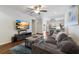 Comfortable living room with stylish furniture and open access to the kitchen at 2411 28Th E Ave, Palmetto, FL 34221