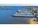 Breathtaking aerial view of the marina, showcasing the extensive waterfront access and surrounding waterways at 2512 Riverside E Dr, Bradenton, FL 34208