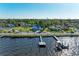 Quaint waterfront home with lush landscaping and community boat docks offers serene coastal lifestyle at 2512 Riverside E Dr, Bradenton, FL 34208