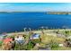 Waterfront home with community boat docks, mature trees, and serene water views at 2512 Riverside E Dr, Bradenton, FL 34208