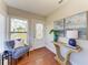 Welcoming foyer area with stylish decor and a seating area with art accents to provide a warm greeting at 2512 Riverside E Dr, Bradenton, FL 34208