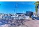 Scenic view of the marina featuring a walkway next to many boats, providing direct access to the waterfront at 2512 Riverside E Dr, Bradenton, FL 34208