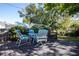 Outdoor deck furnished with a table and chairs for a nice relaxing seating area at 2530 Loma Linda St, Sarasota, FL 34239