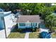 Charming home with neat landscaping, a well-maintained lawn, and a welcoming entrance at 2530 Loma Linda St, Sarasota, FL 34239