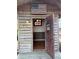 Rustic wooden cabin featuring a custom wooden American flag above the doorway at 2530 Loma Linda St, Sarasota, FL 34239