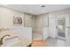 Light and bright bathroom offers a walk-in shower, double vanity, and plenty of space at 347 Ardenwood Dr, Englewood, FL 34223