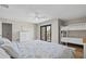 Spacious bedroom featuring a king bed, balcony access, and cozy bunk beds at 347 Ardenwood Dr, Englewood, FL 34223