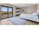 Bedroom with a queen size bed, bunk beds, and sliding glass doors to a balcony at 347 Ardenwood Dr, Englewood, FL 34223
