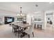 Open dining room connecting living space and kitchen, great for entertaining at 347 Ardenwood Dr, Englewood, FL 34223