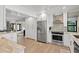 Well-lit kitchen with white cabinetry and stainless steel appliances at 347 Ardenwood Dr, Englewood, FL 34223