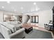 Spacious living room showing an open floor plan and plenty of natural light at 347 Ardenwood Dr, Englewood, FL 34223