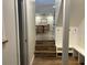 Hallway with stairs leading to dining room at 411 El Greco Dr, Brandon, FL 33511