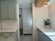 Light and airy kitchen with a view into a hallway at 411 El Greco Dr, Brandon, FL 33511