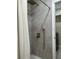 Modern tiled shower with brass fixtures and rainfall shower head at 411 El Greco Dr, Brandon, FL 33511