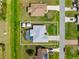 Aerial view of home with pool, fenced yard, shed, and green lawn at 4268 Mulgrave Ave, North Port, FL 34287