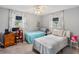 Bedroom with dual beds, windows, carpet and desk at 4268 Mulgrave Ave, North Port, FL 34287