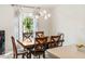 Dining room with modern lighting fixture and window at 4268 Mulgrave Ave, North Port, FL 34287