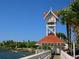 Quaint Clock Tower overlooking the water, with a charming walkway and boat docks nearby at 4411 Mount Vernon Dr, Bradenton, FL 34210