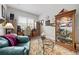 Cozy office space with hardwood furniture and a display case of collectibles at 4691 Claremont Park Dr, Bradenton, FL 34211